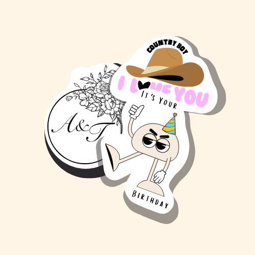 Three custom sticker designs layered together: a floral monogram, a cowboy hat and a birthday character
